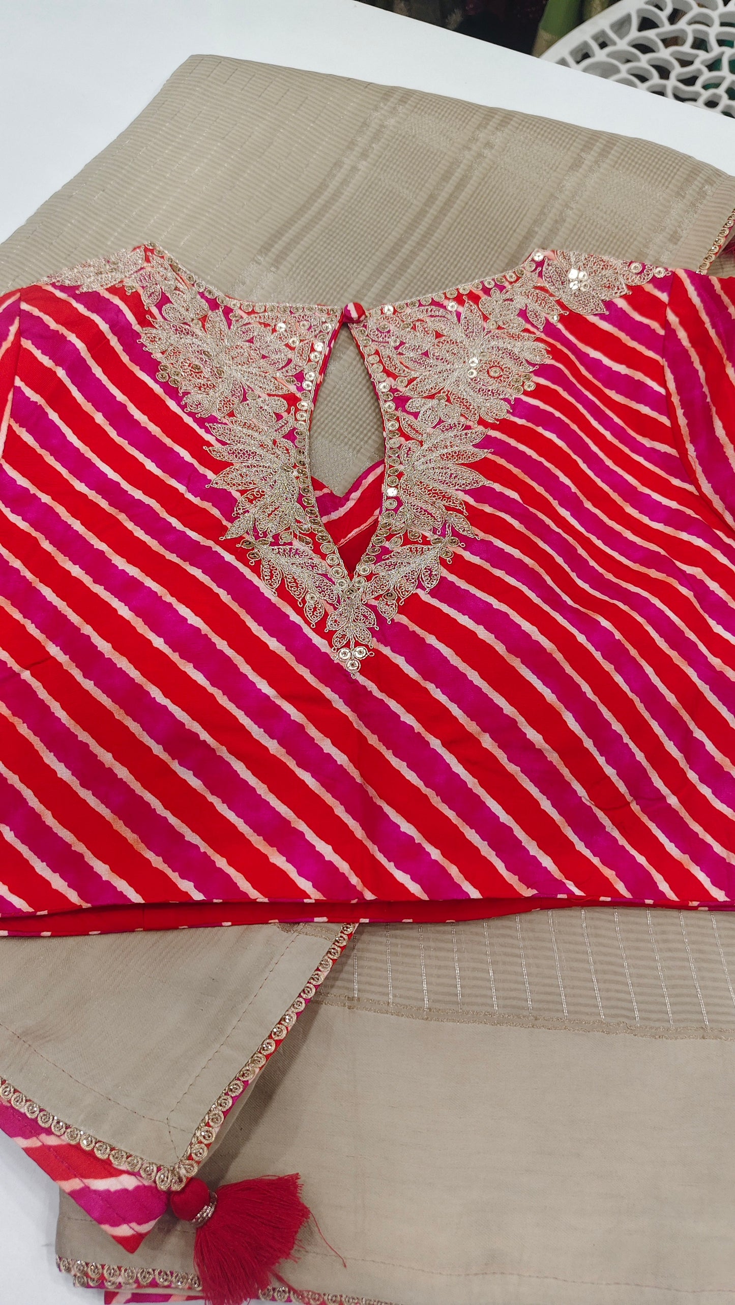 Beige Tissue Silk Saree with Pink Leheriya Designer Blouse & Embroidered Belt